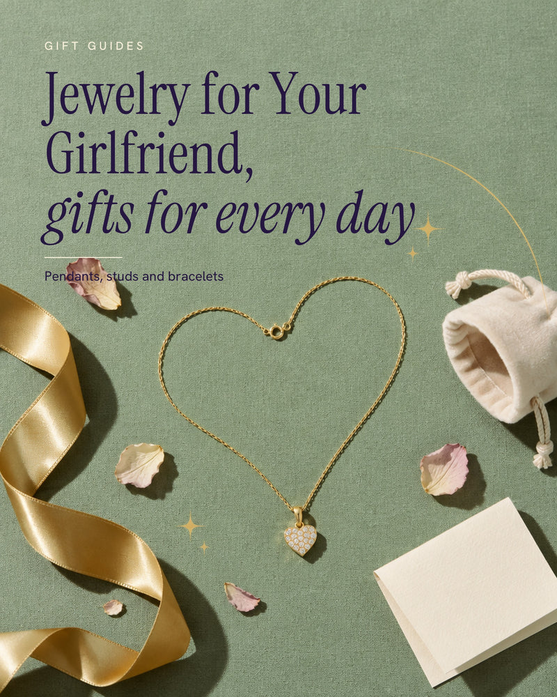 Gift poster seen from above of a gold diamond heart pendant with its chain laid in a heart, a gold ribbon, a pouch and petals on sage linen