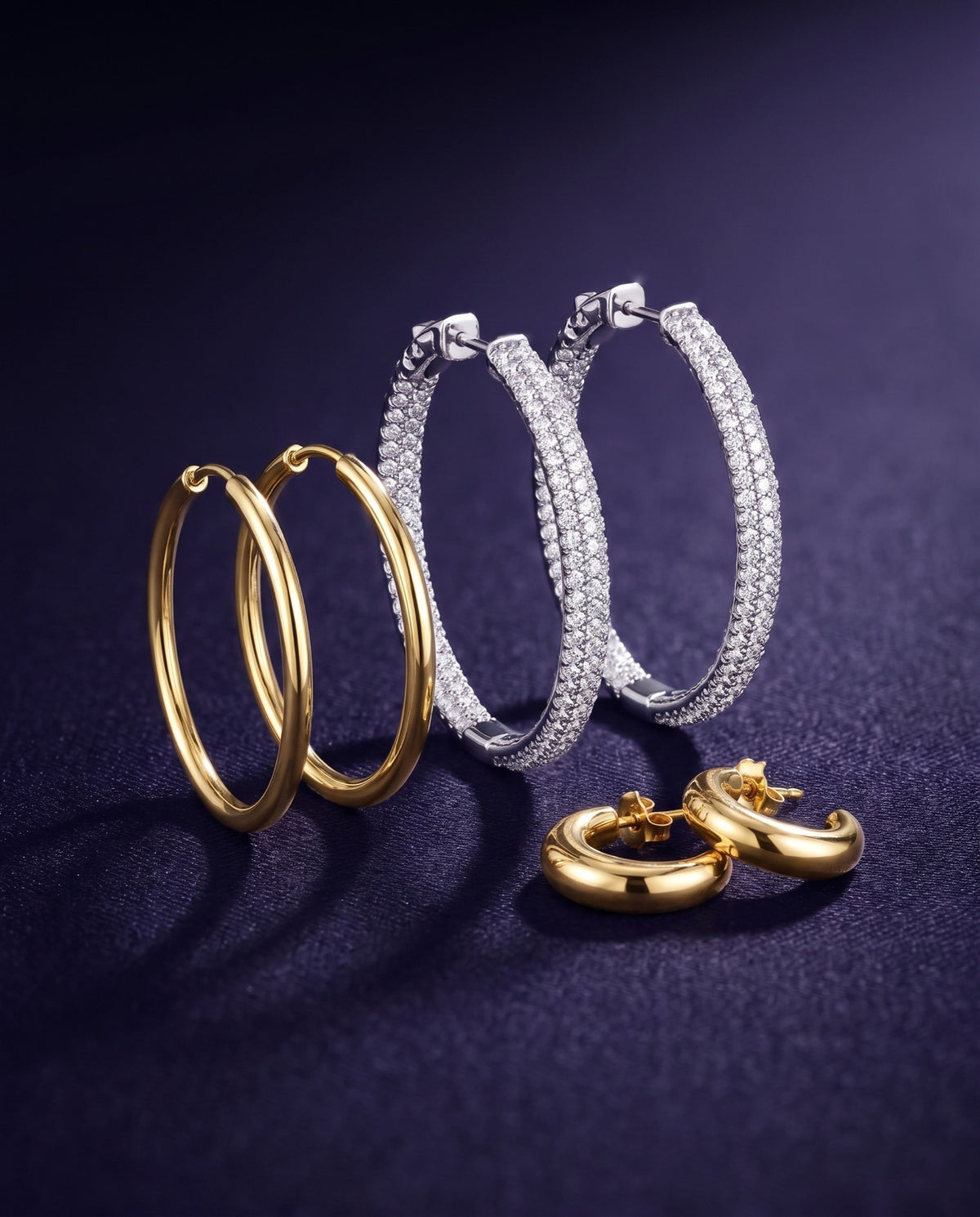 Diamond hoop earrings in 14K white gold with gold endless hoops and huggies in 14K yellow gold