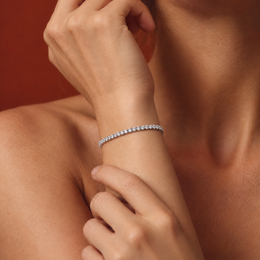 2 carat lab-grown diamond tennis bracelet in 14K white gold worn on the wrist, close-up, AI-generated image — DEEVE