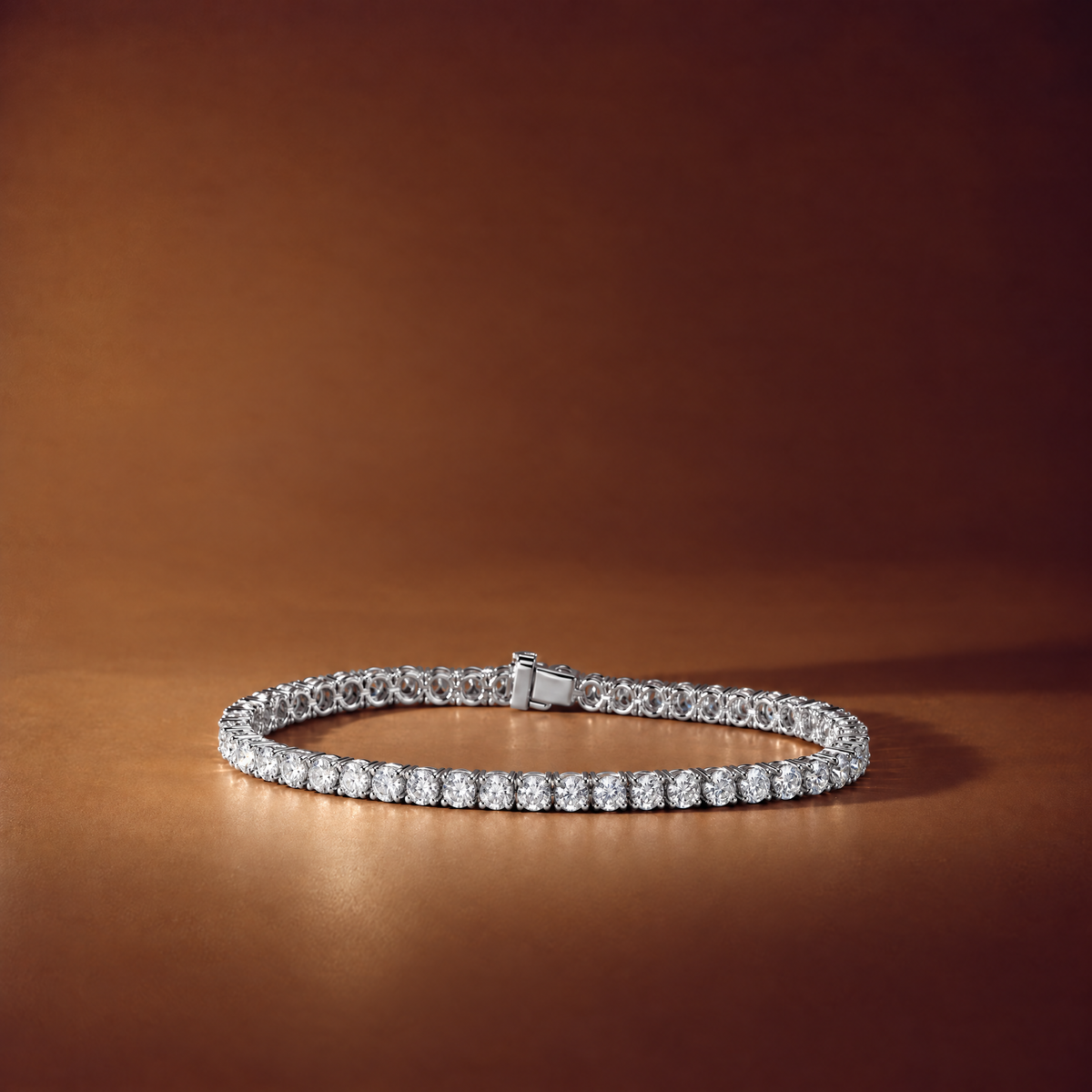 6 carat lab-grown diamond tennis bracelet in 14K white gold lying flat on a brown background, AI-generated image — DEEVE