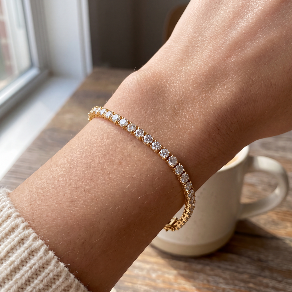 Close-up of a 6 carat lab-grown diamond tennis bracelet in 14K yellow gold worn on the wrist, AI-generated image — DEEVE