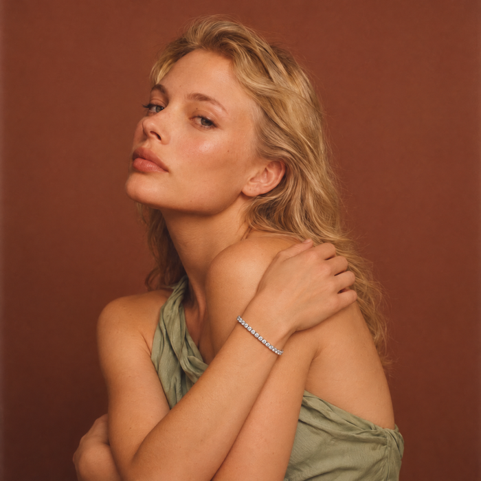 Model wearing a 7 carat lab-grown diamond tennis bracelet in 14K white gold, AI-generated image — DEEVE