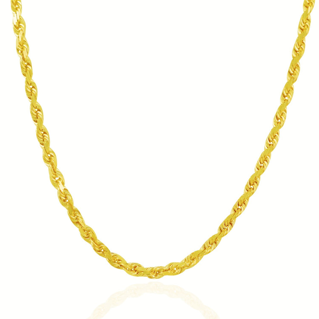 Solid rope chain in 14K yellow gold hanging in a curve
