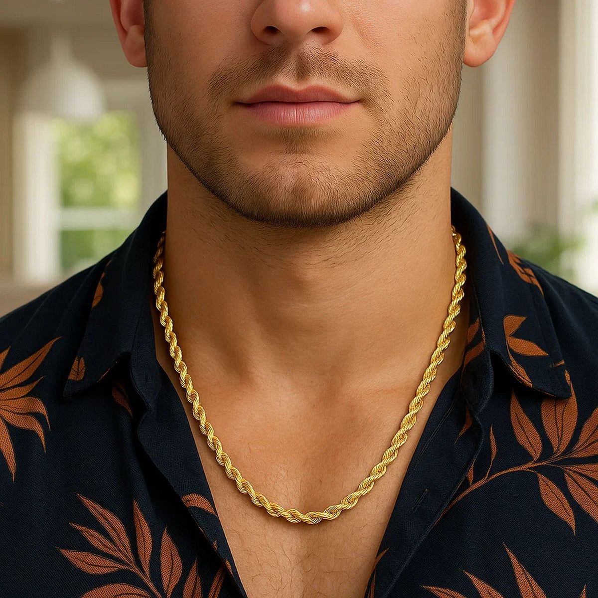 5.00mm rope chain in 14K yellow gold worn with a patterned open shirt