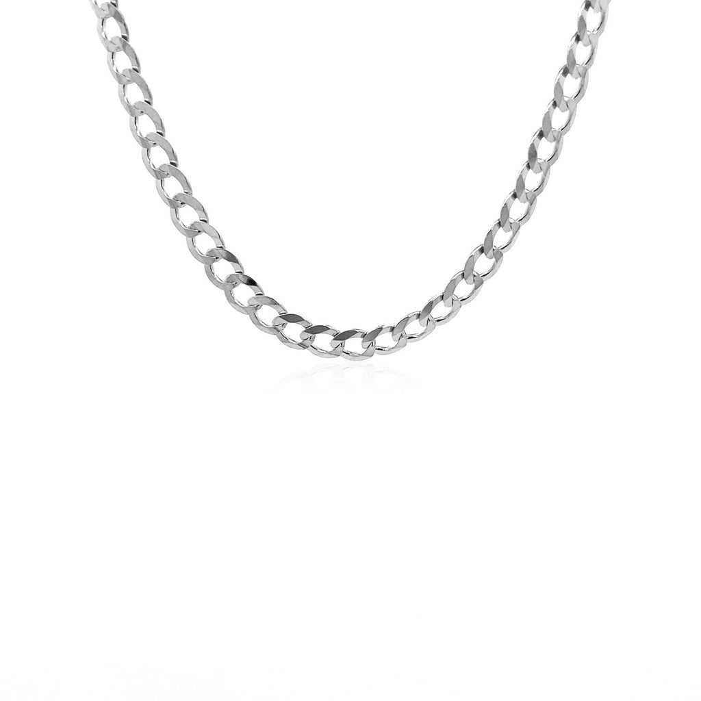 Solid curb chain in 14K white gold hanging in a curve