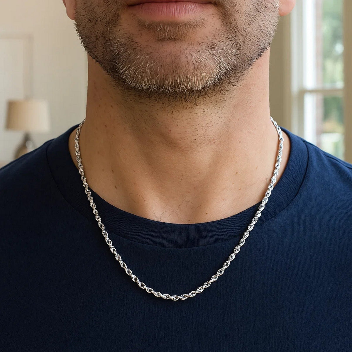 3.00mm rope chain in 14K white gold worn over a navy T-shirt