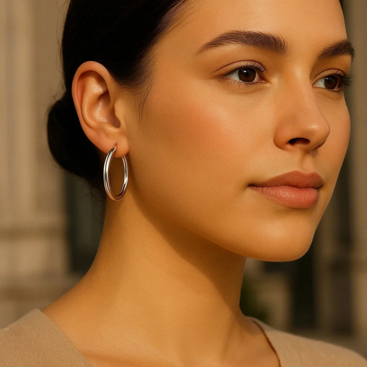 30mm 14K white gold hoop worn, three-quarter view