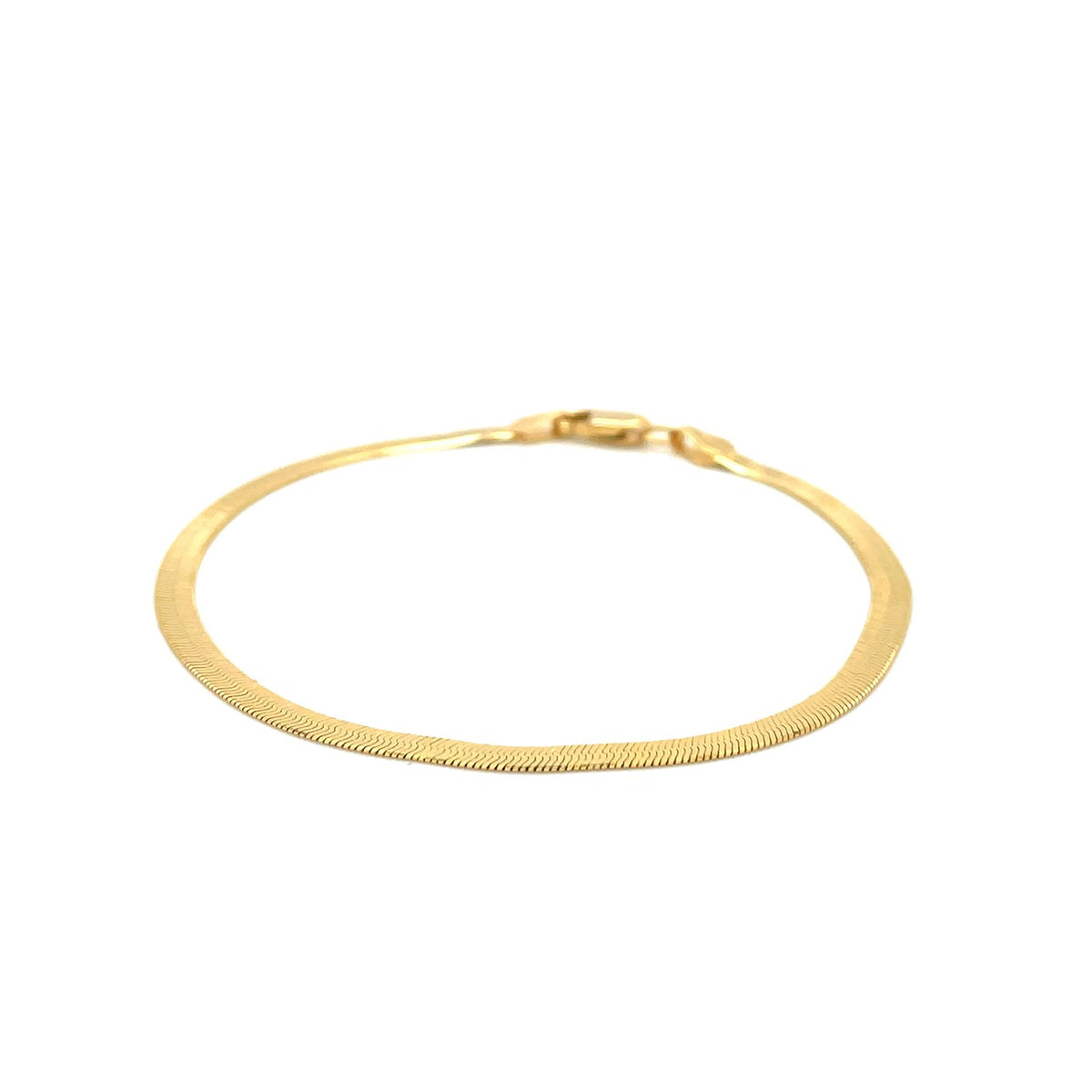Super Flex herringbone bracelet in 14K yellow gold, 2.80mm, laid flat in a circle