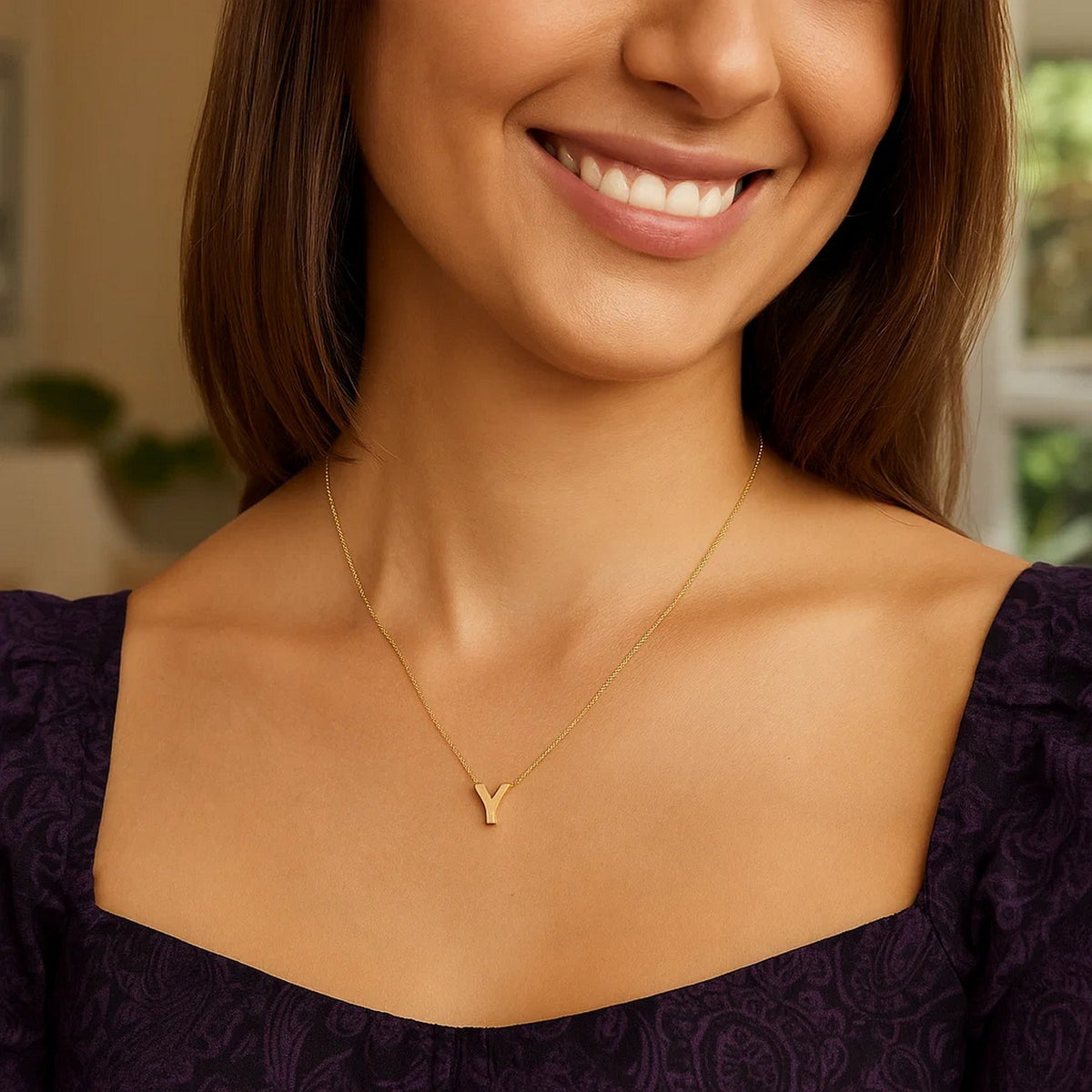 Block letter Y initial necklace in 14K yellow gold worn, second view
