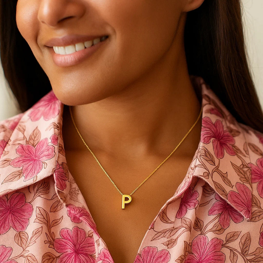 Block letter P initial necklace in 14K yellow gold worn, second view