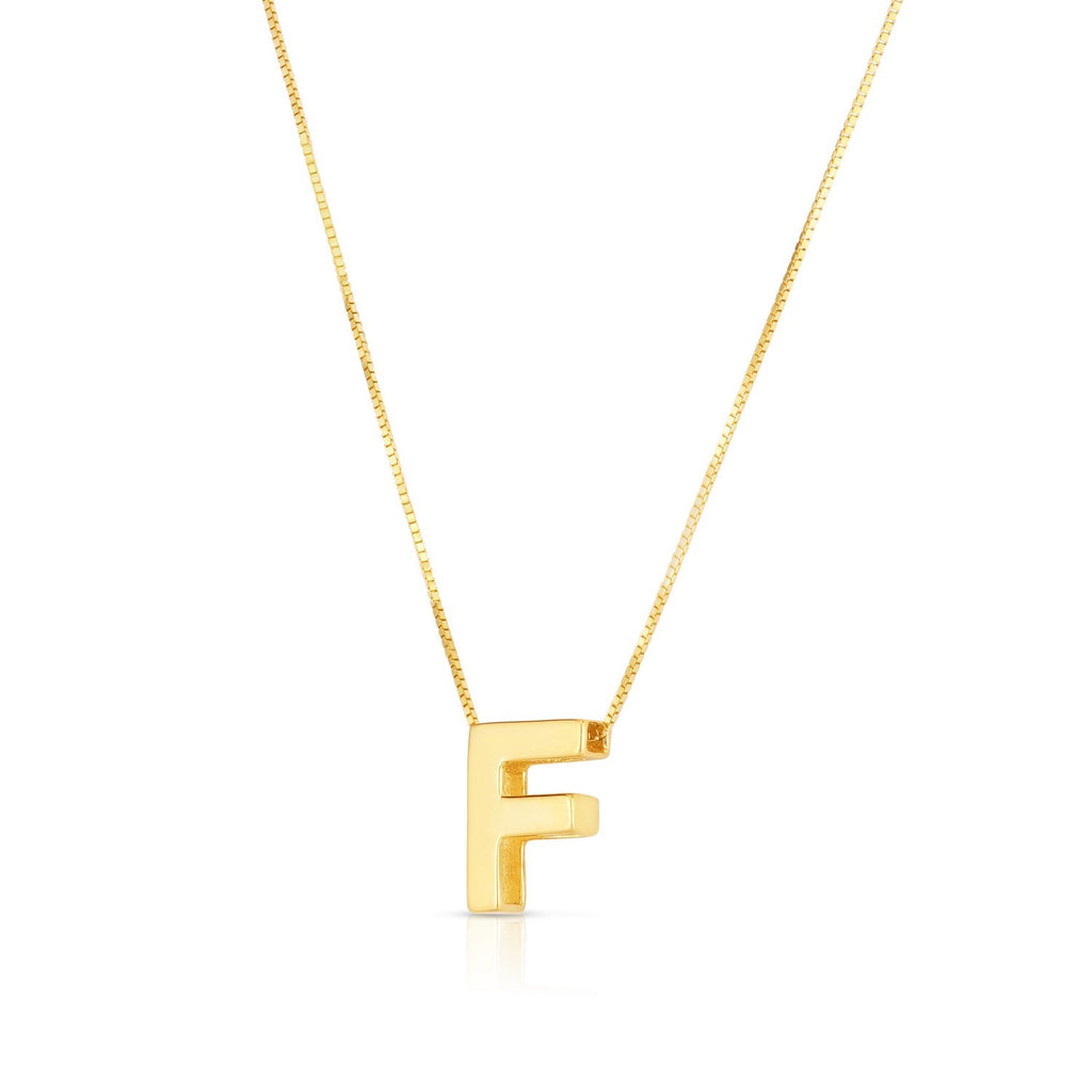 Block letter F in polished 14K yellow gold, angled to show its depth, on a box chain
