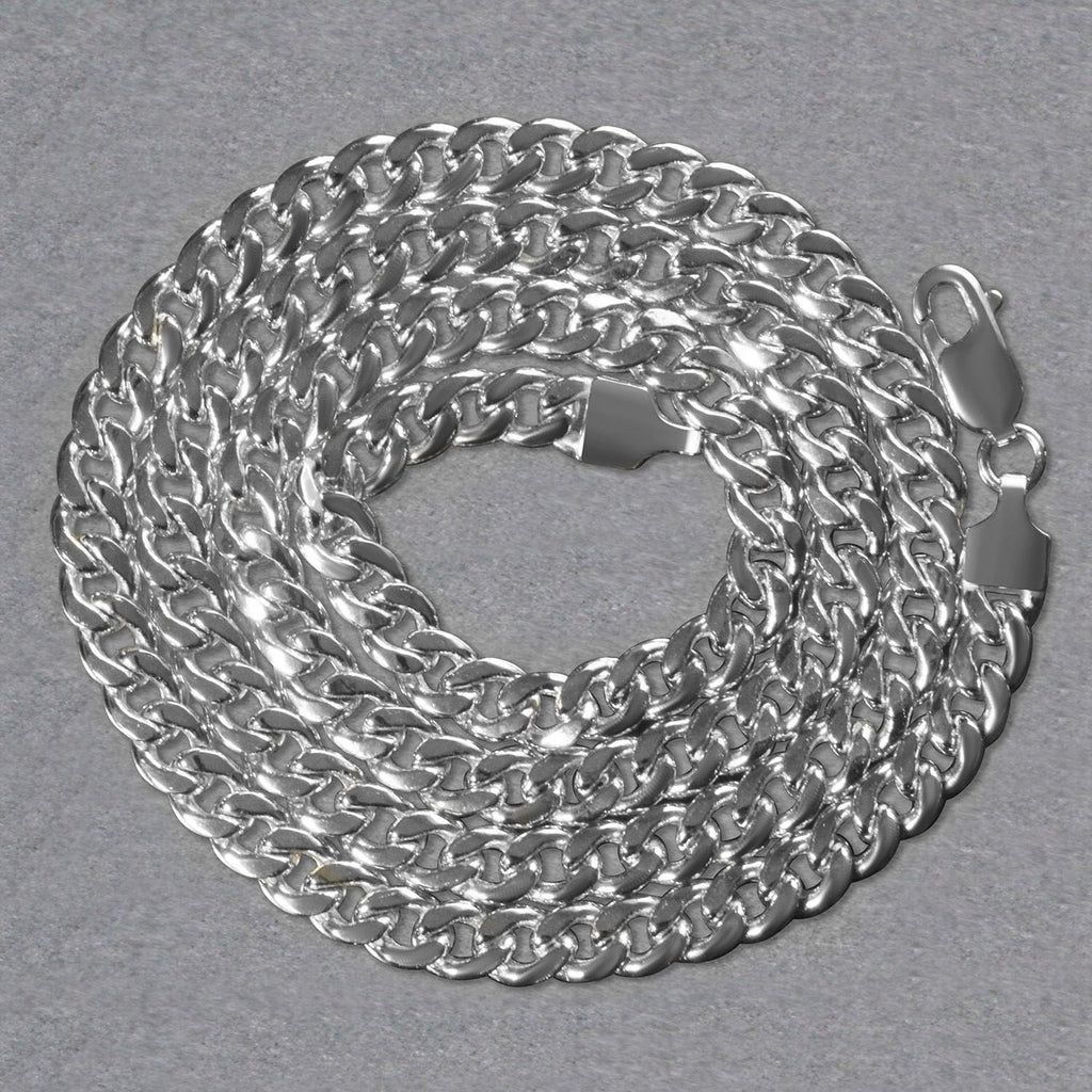 14K white gold Miami Cuban chain, 5.50mm, coiled to show the links