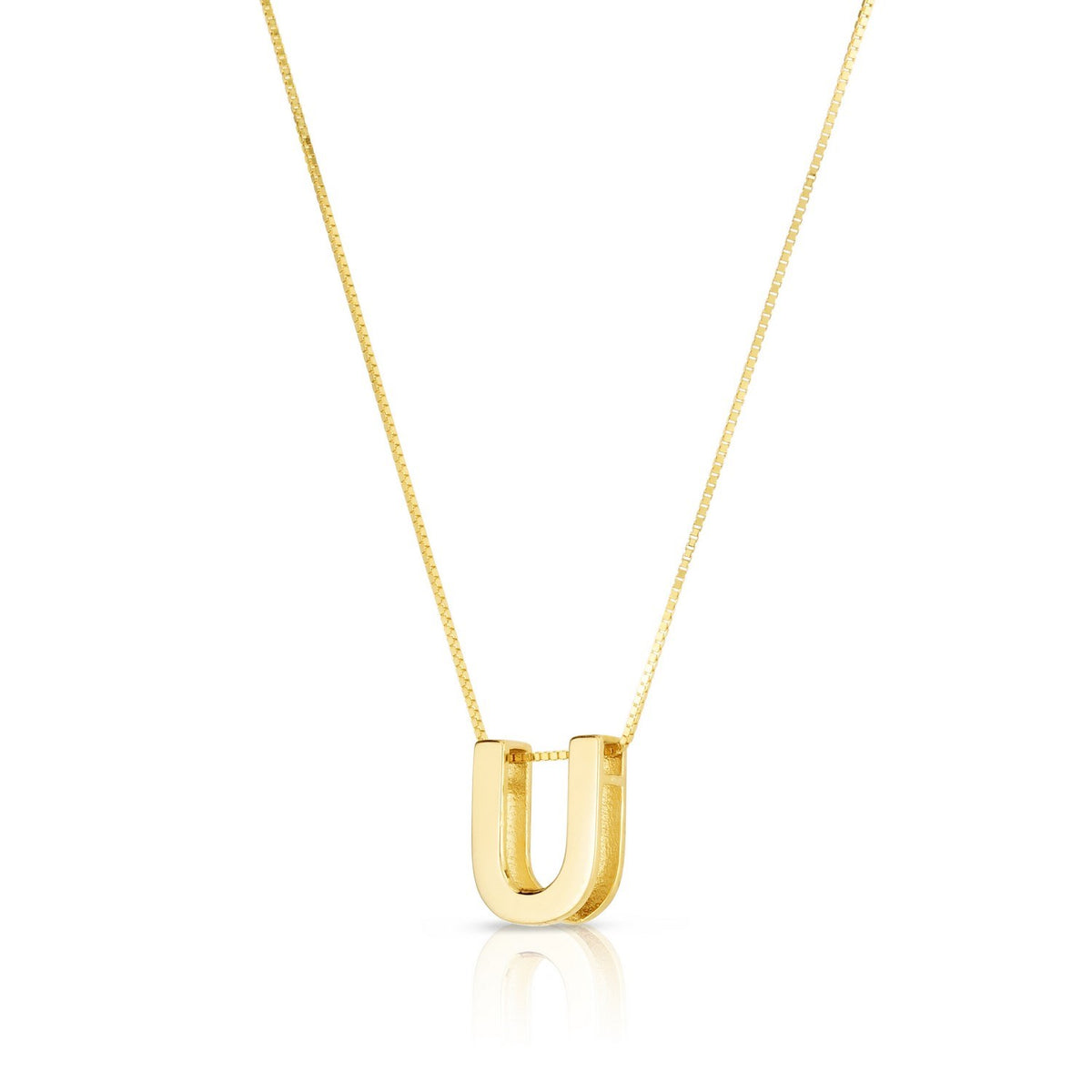 Block letter U in polished 14K yellow gold, angled to show its depth, on a box chain