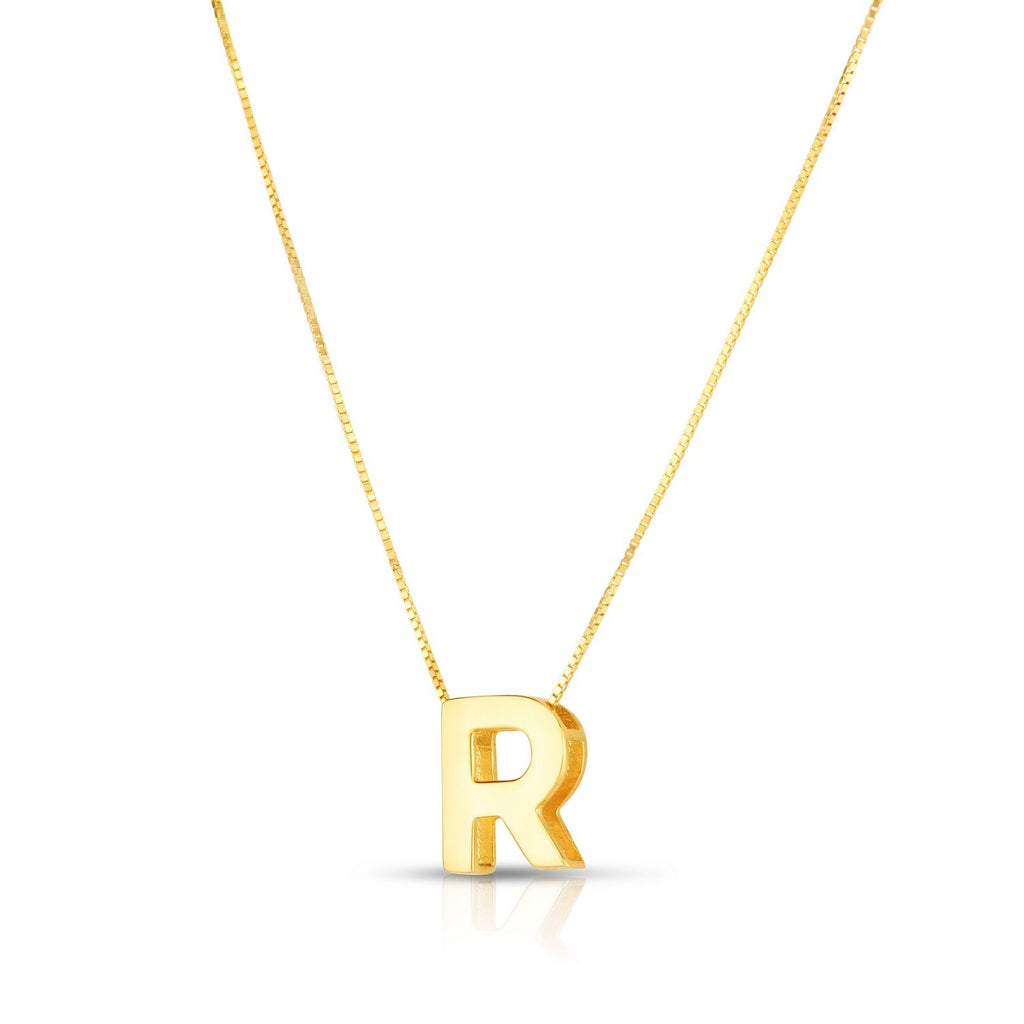 Block letter R in polished 14K yellow gold, angled to show its depth, on a box chain