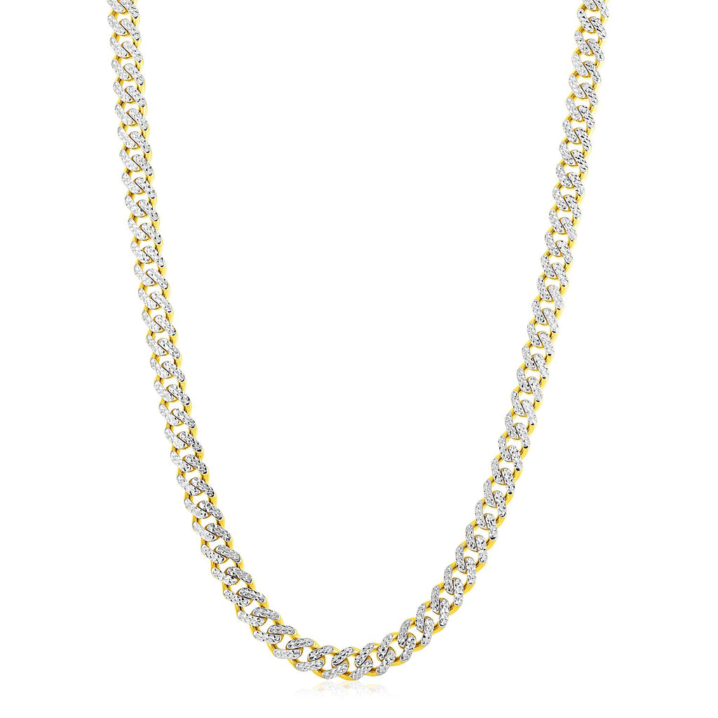 Two-tone Miami Cuban chain in 14K gold hanging in a curve