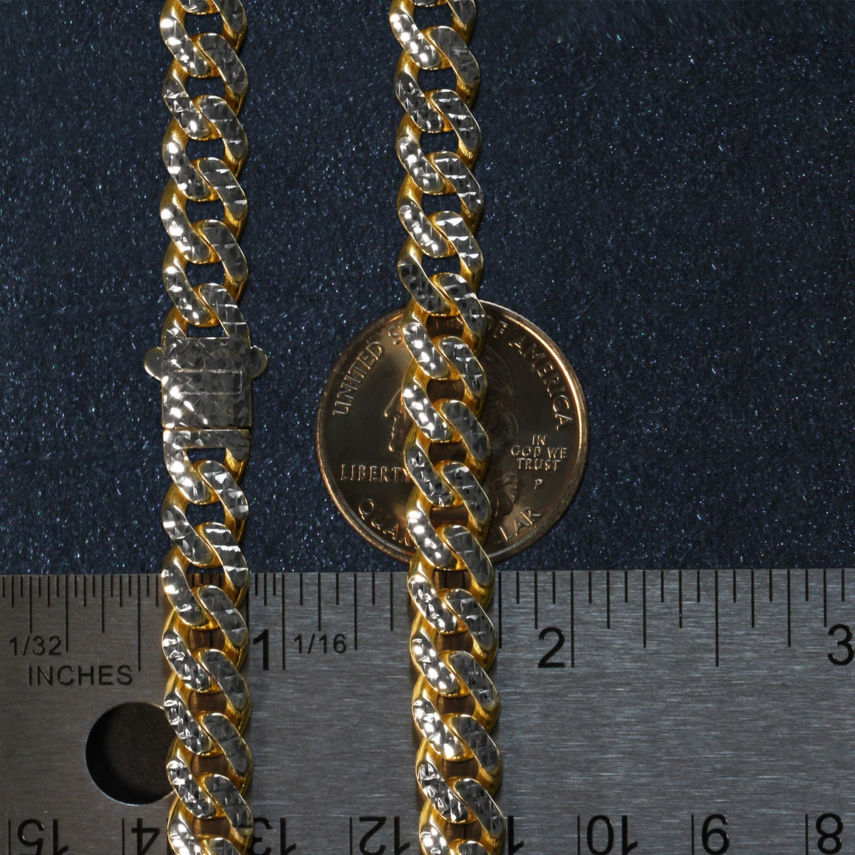 8.00mm two-tone Miami Cuban chain beside an inch ruler and a coin for scale