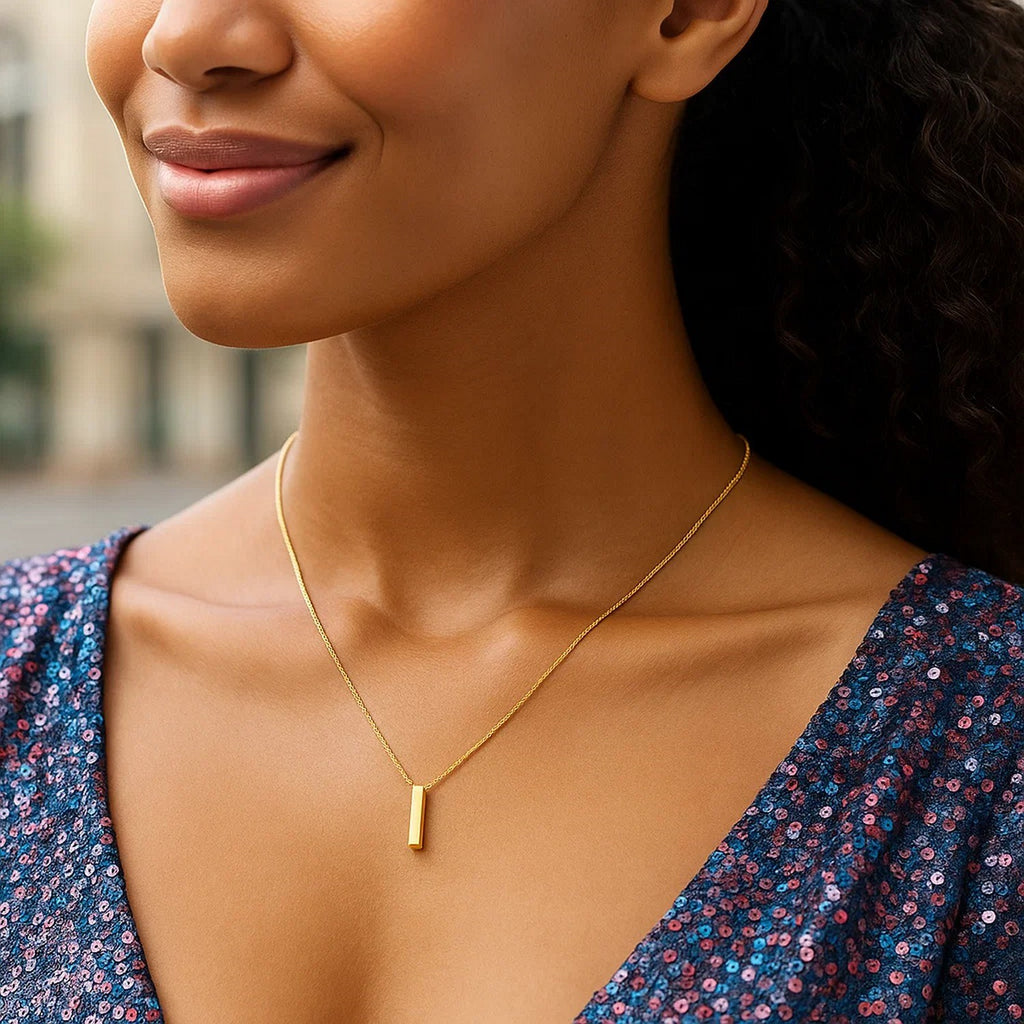 Block letter I initial necklace in 14K yellow gold worn, second view