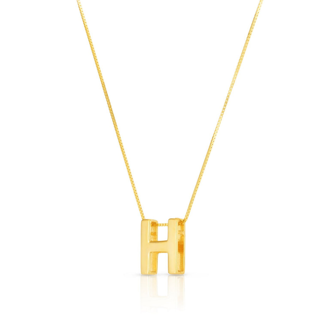 Block letter H in polished 14K yellow gold, angled to show its depth, on a box chain