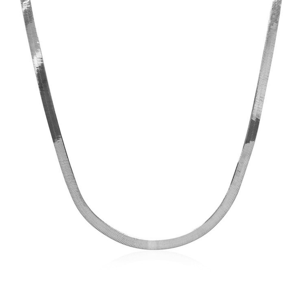 Herringbone chain in 14K white gold hanging in a curve