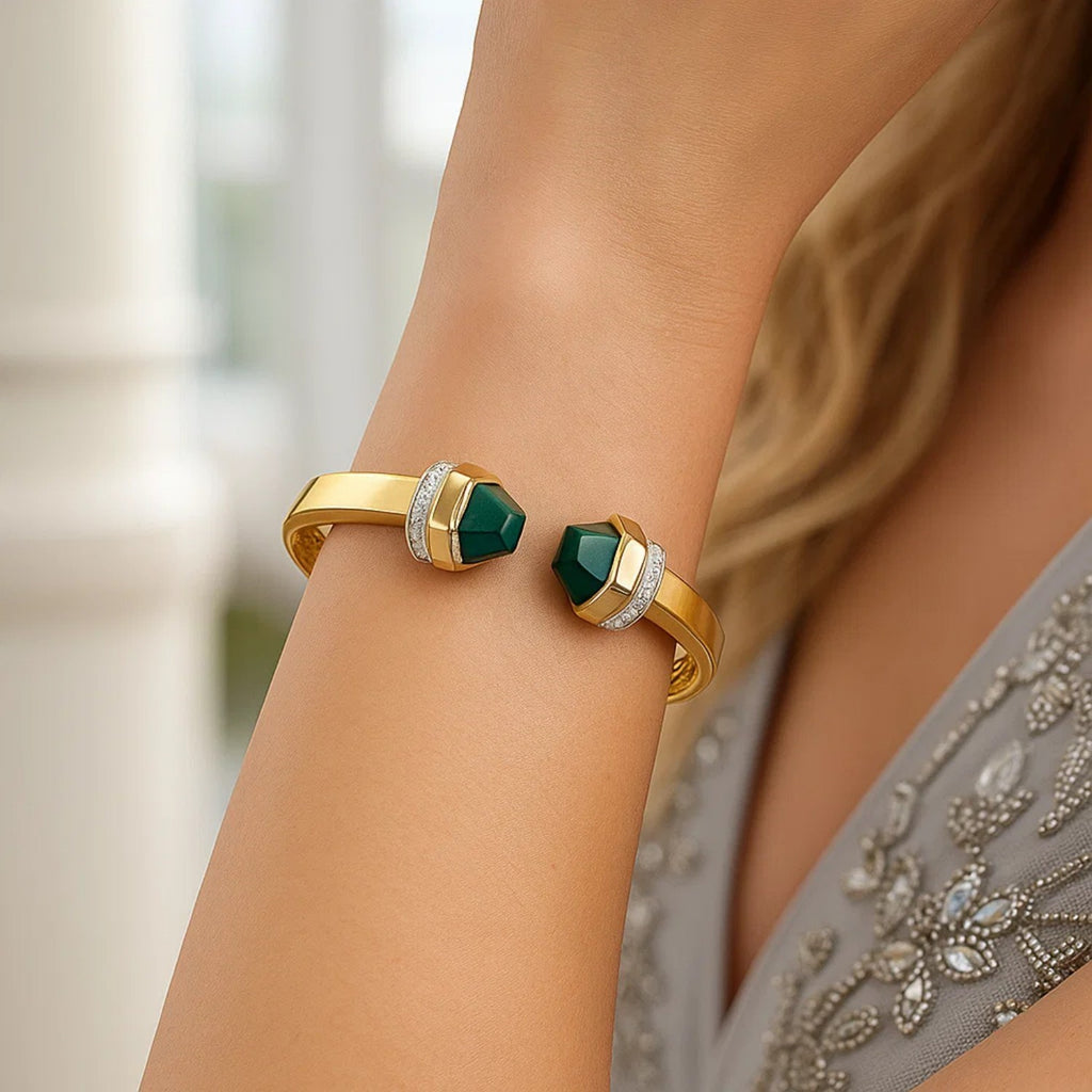 Woman wearing the 14K yellow gold malachite cuff
