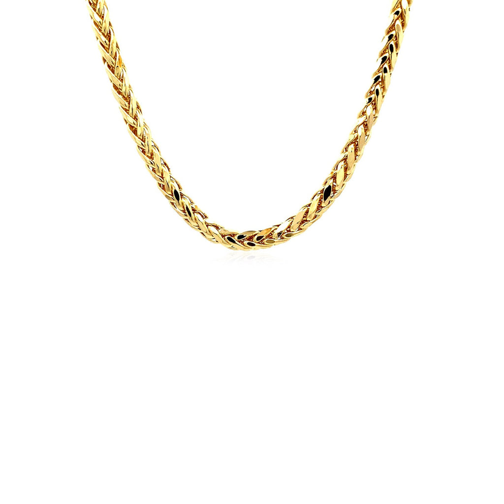 Franco chain in 14K yellow gold hanging in a curve